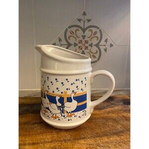 Blue ribbon goose pitcher